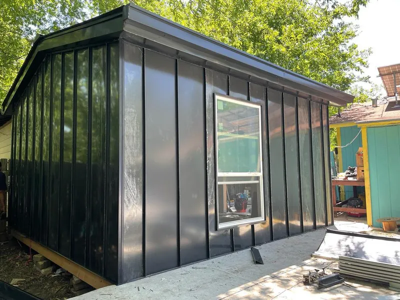 Black standing seam metal wall panels for Metal Roof Installation in Oak Point